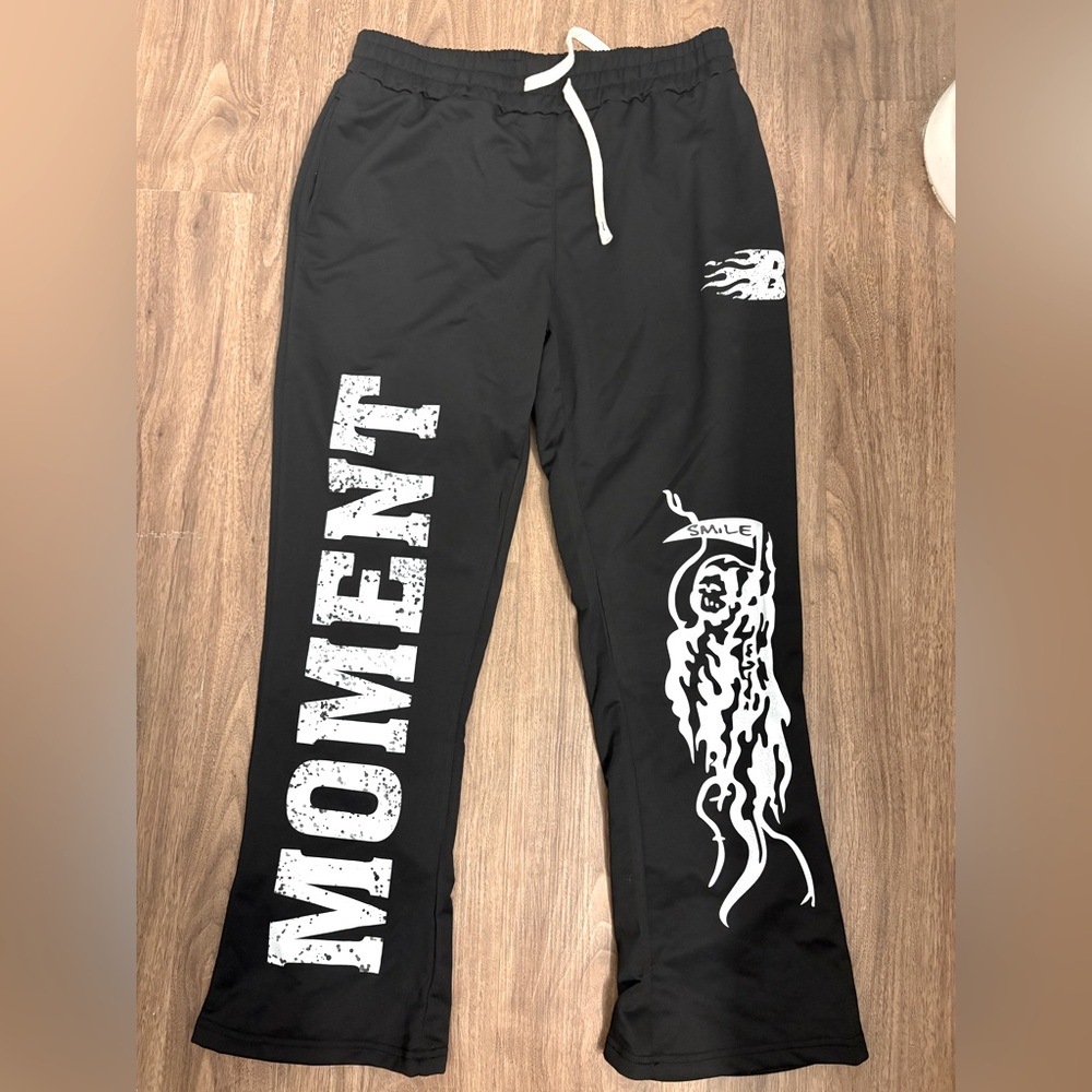 "Elevate Your Comfort: Premium Black New Balance Sweatpants in Size Large!"